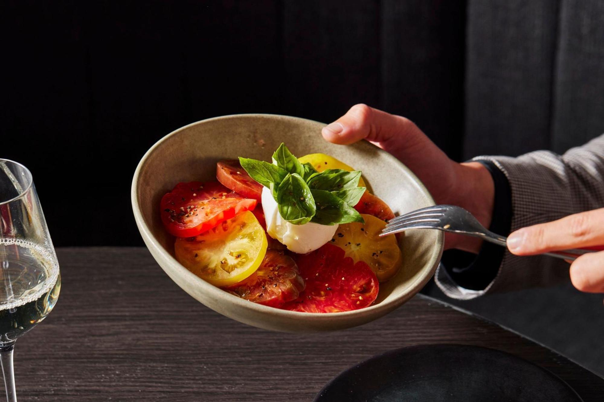 Melbourne Marriott Hotel Docklands Dış mekan fotoğraf A tomato salad with mozzarella and basil