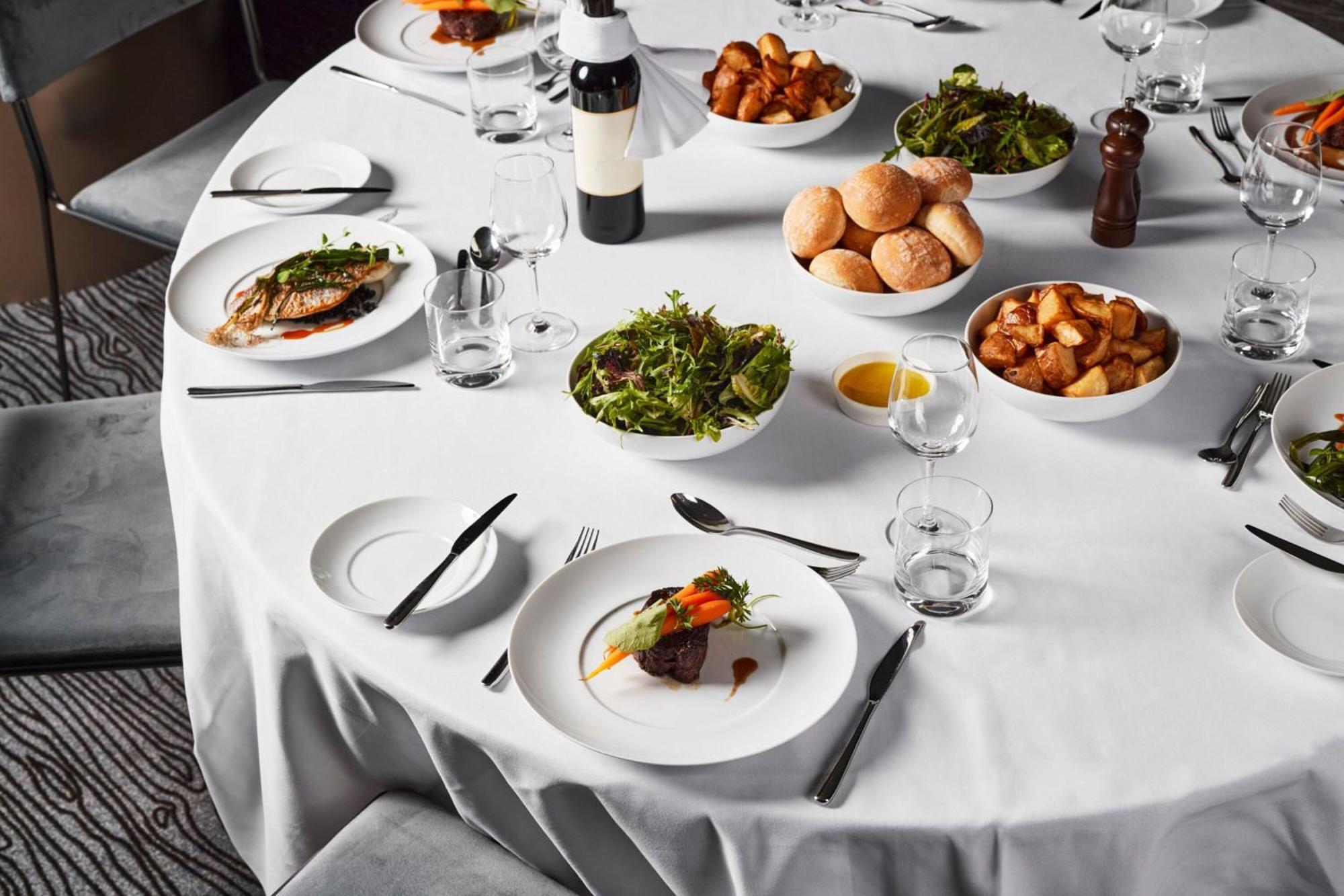 Melbourne Marriott Hotel Docklands Dış mekan fotoğraf A table set for a formal dinner
